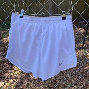 White Nike shorts